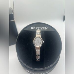 Silver Women's Quartz Watch with Mother of Pearl Face and Roman Numerals Design